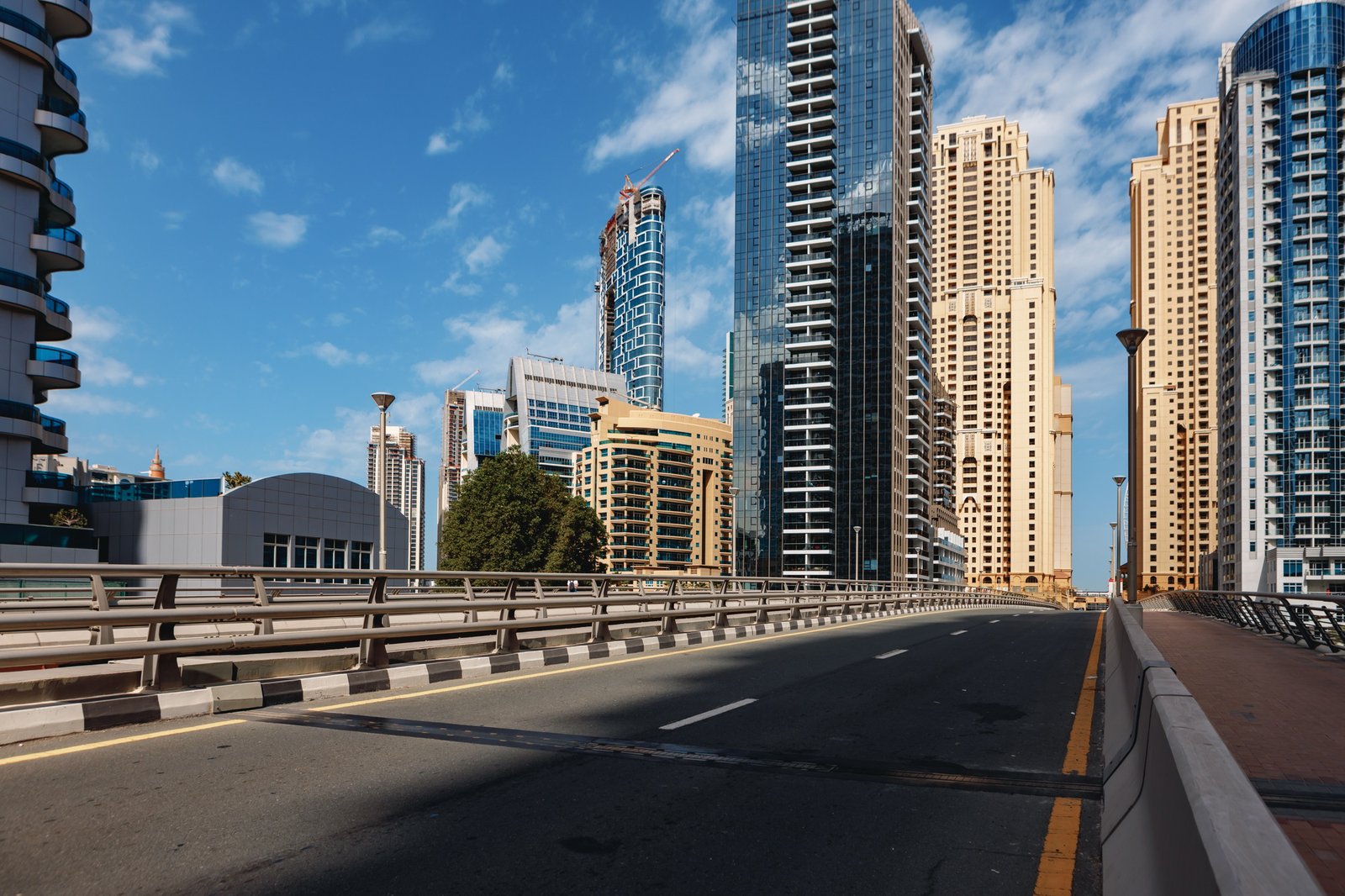 Urban road cityscape of Dubai at daytime